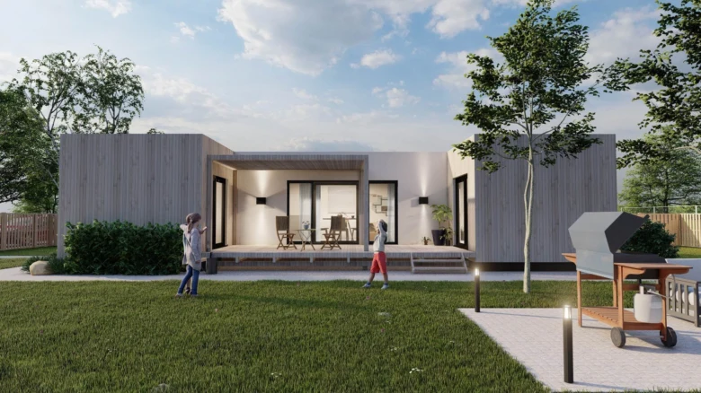 Moderní modulový dům s zahradou, dětmi hrajícími se před domem.