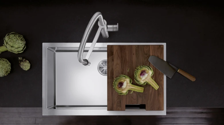 Kitchen sink with cutting board
