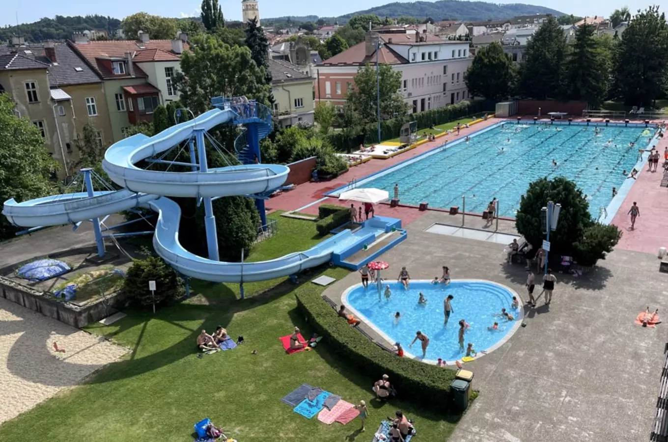 Outdoor swimming pool complex with slides