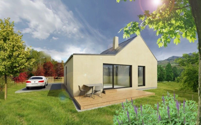 Moderní montovaný bungalov s terasou a parkovaným autem na trávníku.