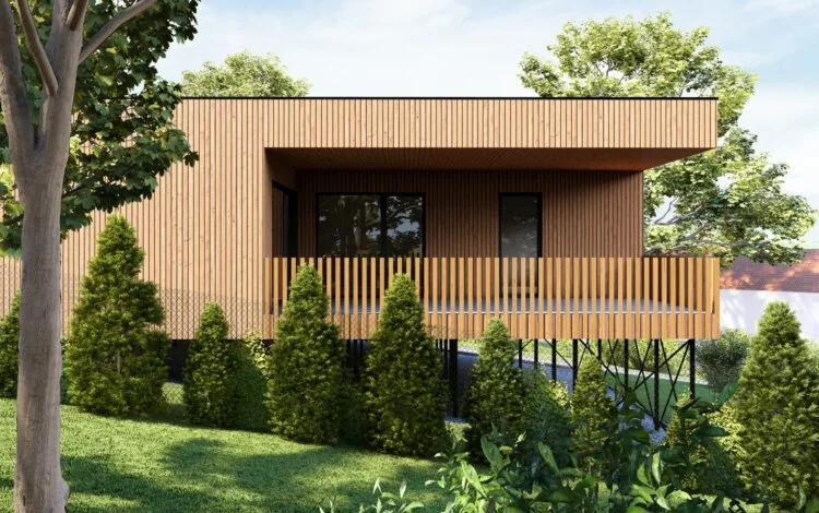 Moderní dřevostavba na sloupech v zeleném prostředí